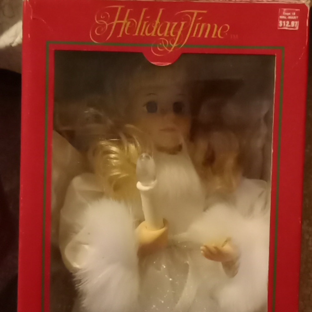 24 years old Mr and Mrs Clause from 1998 and Angel